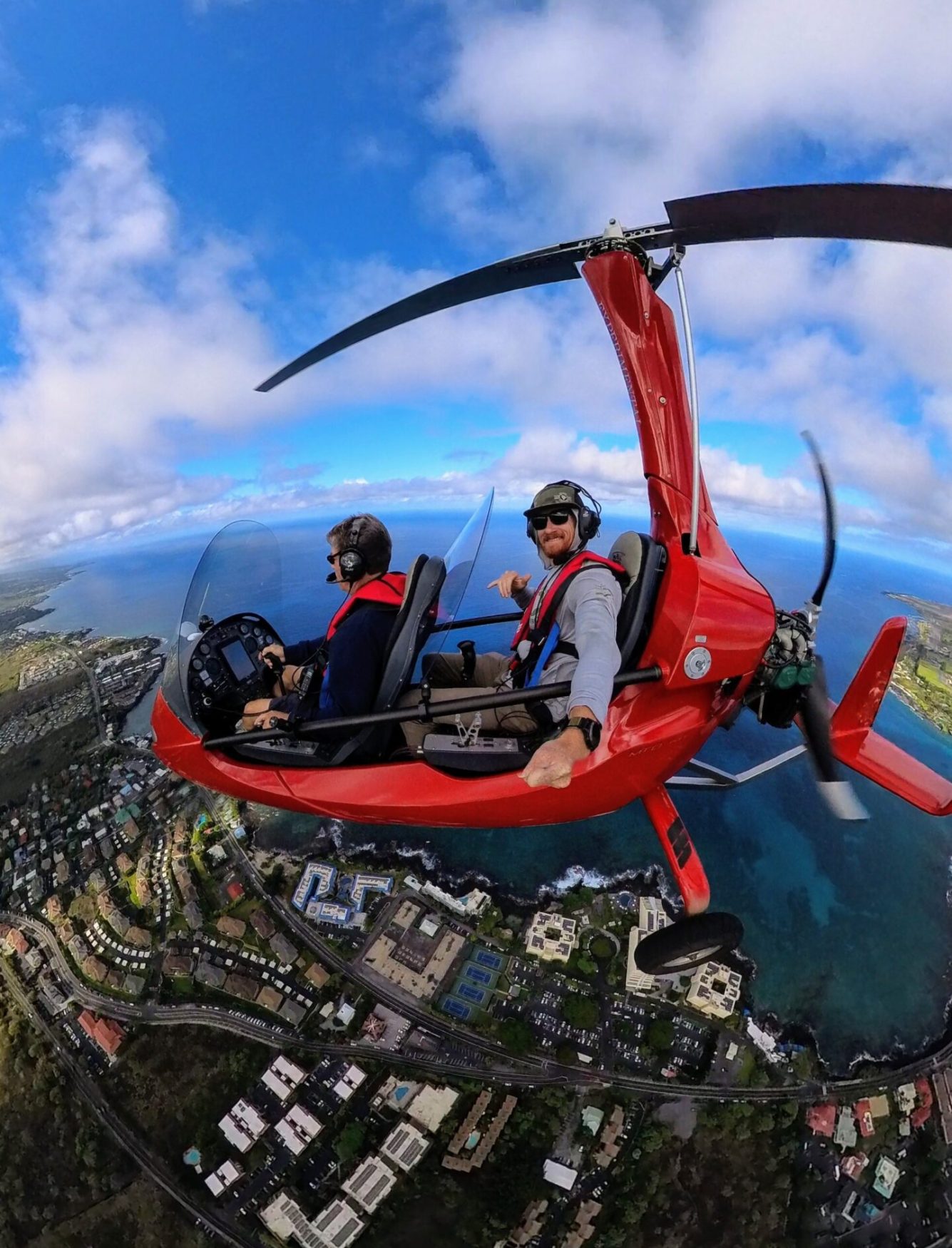 Gyroplane training flight above Kona coastline