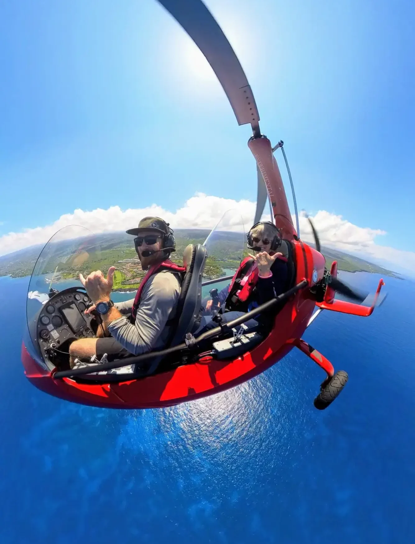 Gyroplane training flight above Kona coastline